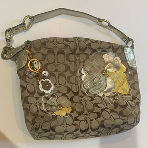 Coach Bleeker Brown and Gold leather Floral Shoulder Bag w/unbranded bag charm.